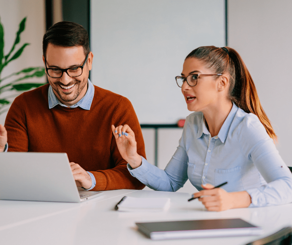 Man and Women talking about business