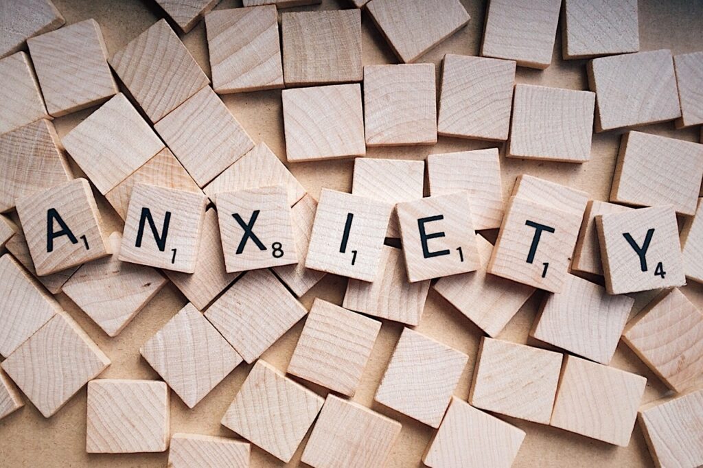 Scrabble tiles spelling the word anxiety